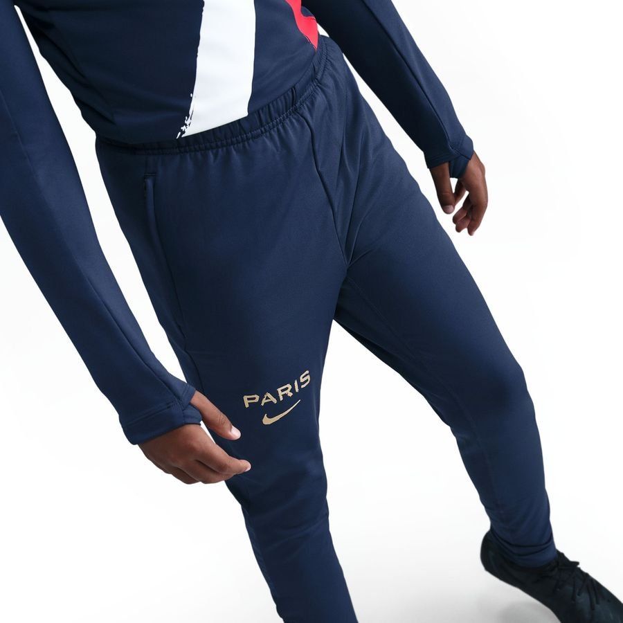 Paris Saint Germain Training Trousers Dri-FIT Strike Away - Midnight Navy/Metallic Gold Kids-SoccerKits Hub | Buy Soccer Jerseys Online